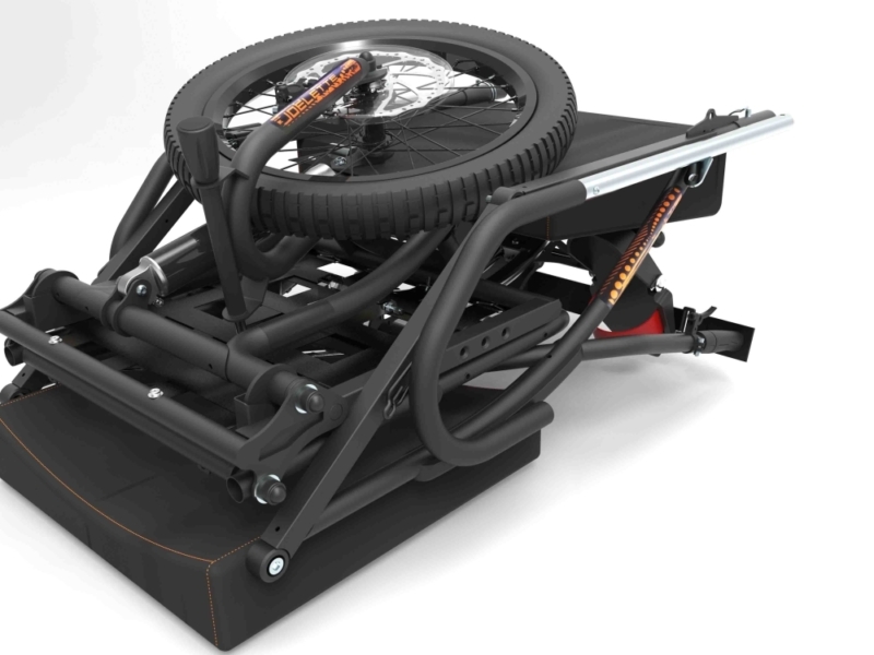 Porte-vélos pliable pour attelage, avec roue de vélo et structure de transport robuste.