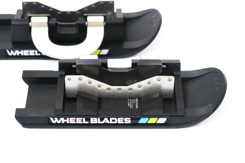 Lames de patins Wheel Blades, accessoires pour fauteuil roulant adaptés aux activités hivernales en camping.